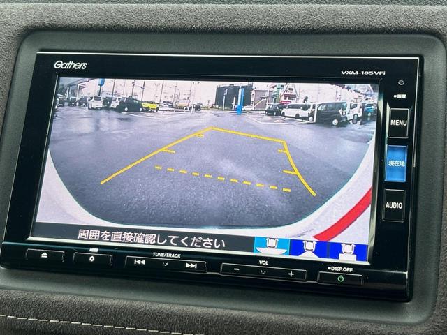 ヴェゼル ハイブリッドRS・ホンダセンシング 純正ナビ 衝突軽減ブレーキ レーダークルーズ 誤発進抑制機能 車線逸脱警報 先行車発進お知らせ機能 標識認識機能 ETC Bluetooth再生 DVD再生 バックカメラ シートヒーター 地デジTV(4枚目)