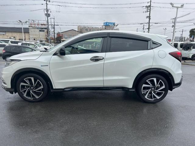 ヴェゼル ハイブリッドRS・ホンダセンシング 純正ナビ 衝突軽減ブレーキ レーダークルーズ 誤発進抑制機能 車線逸脱警報 先行車発進お知らせ機能 標識認識機能 ETC Bluetooth再生 DVD再生 バックカメラ シートヒーター 地デジTV(16枚目)