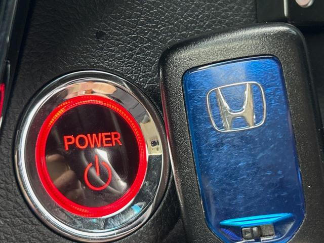 ヴェゼル ハイブリッドRS・ホンダセンシング 純正ナビ 衝突軽減ブレーキ レーダークルーズ 誤発進抑制機能 車線逸脱警報 先行車発進お知らせ機能 標識認識機能 ETC Bluetooth再生 DVD再生 バックカメラ シートヒーター 地デジTV(20枚目)