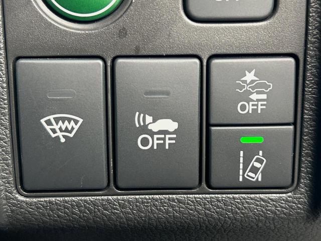 ヴェゼル ハイブリッドRS・ホンダセンシング 純正ナビ 衝突軽減ブレーキ レーダークルーズ 誤発進抑制機能 車線逸脱警報 先行車発進お知らせ機能 標識認識機能 ETC Bluetooth再生 DVD再生 バックカメラ シートヒーター 地デジTV(26枚目)