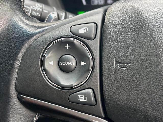 ヴェゼル ハイブリッドRS・ホンダセンシング 純正ナビ 衝突軽減ブレーキ レーダークルーズ 誤発進抑制機能 車線逸脱警報 先行車発進お知らせ機能 標識認識機能 ETC Bluetooth再生 DVD再生 バックカメラ シートヒーター 地デジTV(31枚目)