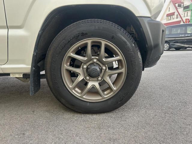 ジムニー XC Strada製ナビゲーション 禁煙車 衝突軽減ブレーキ 車線逸脱警報 先行車発進お知らせ機能 オートハイビーム 標識認識機能 ETC バックカメラ シートヒーター LEDヘッドライト(33枚目)