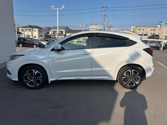 ヴェゼル ハイブリッドＺ・ホンダセンシング　ホンダセンシング／レーダークルーズ／純正ナビ／車線逸脱警報／バックカメラ／ＥＴＣ／ＬＥＤヘッド／前席シートヒーター／デュアルオートエアコン／パドルシフト／ハーフレザー／電子パーキング（17枚目）