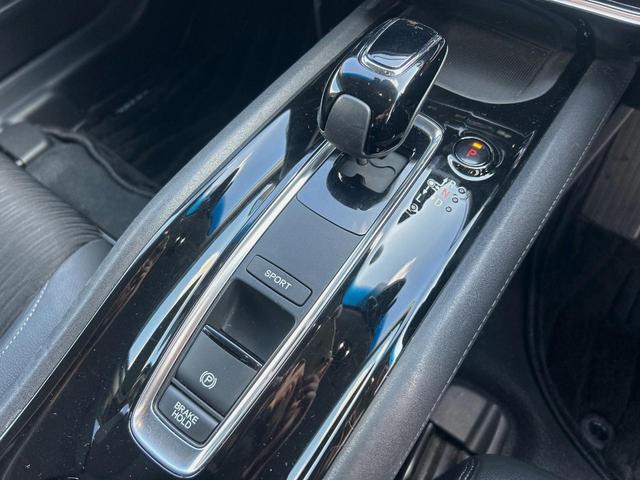 ヴェゼル ハイブリッドＺ・ホンダセンシング　ホンダセンシング／レーダークルーズ／純正ナビ／車線逸脱警報／バックカメラ／ＥＴＣ／ＬＥＤヘッド／前席シートヒーター／デュアルオートエアコン／パドルシフト／ハーフレザー／電子パーキング（28枚目）