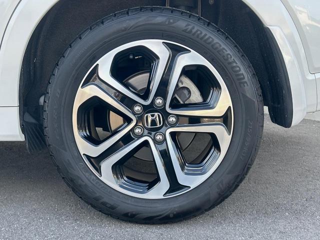 ヴェゼル ハイブリッドＺ・ホンダセンシング　ホンダセンシング／レーダークルーズ／純正ナビ／車線逸脱警報／バックカメラ／ＥＴＣ／ＬＥＤヘッド／前席シートヒーター／デュアルオートエアコン／パドルシフト／ハーフレザー／電子パーキング（55枚目）