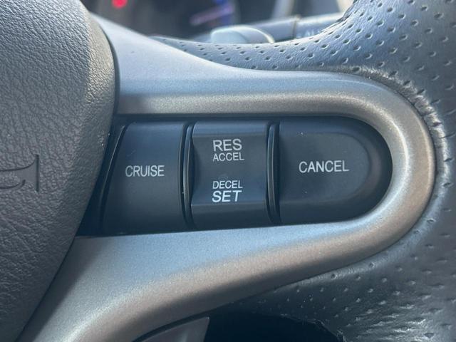 フィットハイブリッド ナビプレミアムセレクション　純正ナビ　禁煙車　バックカメラ　ＥＴＣ　クルーズコントロール　パドルシフト　シートヒーター　革巻きステアリング　純正１５インチアルミ　横滑り防止装置　スマートキー（29枚目）