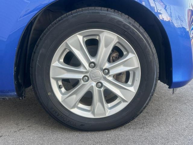 フィットハイブリッド ナビプレミアムセレクション　純正ナビ　禁煙車　バックカメラ　ＥＴＣ　クルーズコントロール　パドルシフト　シートヒーター　革巻きステアリング　純正１５インチアルミ　横滑り防止装置　スマートキー（38枚目）