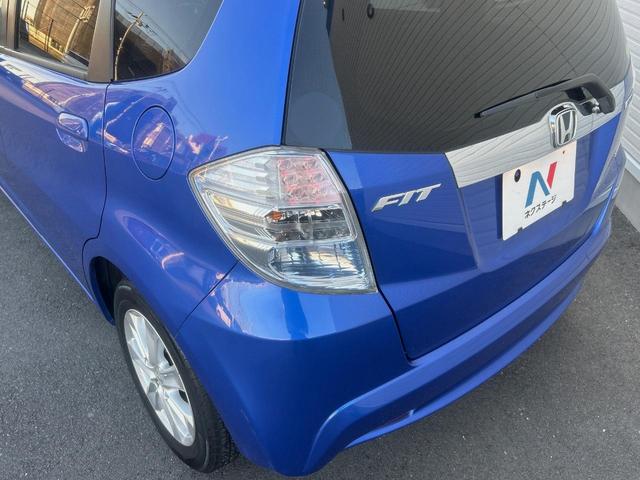 フィットハイブリッド ナビプレミアムセレクション　純正ナビ　禁煙車　バックカメラ　ＥＴＣ　クルーズコントロール　パドルシフト　シートヒーター　革巻きステアリング　純正１５インチアルミ　横滑り防止装置　スマートキー（41枚目）