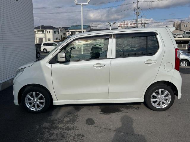 ワゴンR FXリミテッド 禁煙車 CD再生 アイドリングストップ フォグライト 14インチアルミ ヘッドライトレベライザー 革巻きステアリング オートエアコン スマートキー プッシュスタート シートリフター 電動格納ミラー(16枚目)