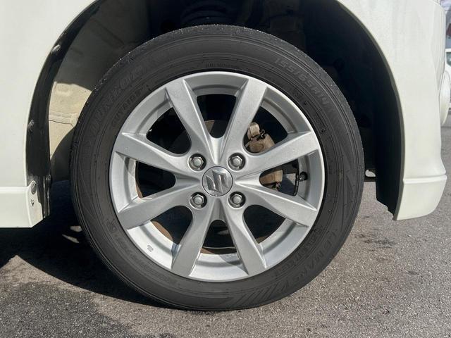 ワゴンR FXリミテッド 禁煙車 CD再生 アイドリングストップ フォグライト 14インチアルミ ヘッドライトレベライザー 革巻きステアリング オートエアコン スマートキー プッシュスタート シートリフター 電動格納ミラー(29枚目)