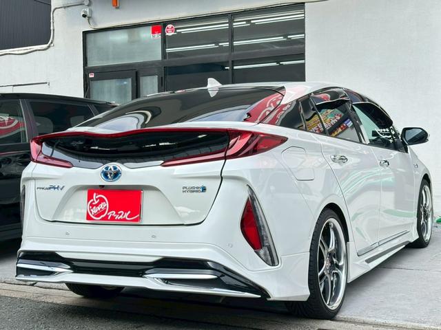 プリウスＰＨＶ Ｓセーフティプラス　ワンオーナー　モデリスタフルエアロ　ＷＯＲＫ１９インチアルミホイール　純正ホイールセット有　９インチナビＴＶ　ステアリングヒーター　デジタルインナーミラー　追従機能付　ドライブレコーダー　ＥＴＣ（18枚目）