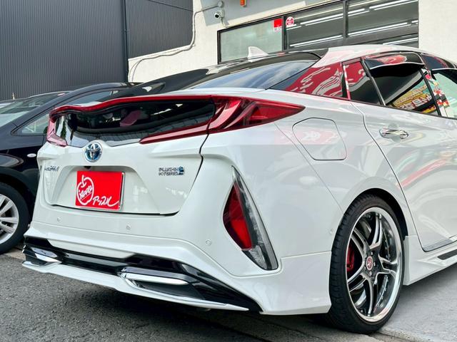 プリウスＰＨＶ Ｓセーフティプラス　ワンオーナー　モデリスタフルエアロ　ＷＯＲＫ１９インチアルミホイール　純正ホイールセット有　９インチナビＴＶ　ステアリングヒーター　デジタルインナーミラー　追従機能付　ドライブレコーダー　ＥＴＣ（21枚目）