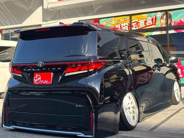 ヴェルファイアハイブリッド Z プレミア 室内車庫保管 エアサス WORK製SCHWERT BRUNNEN20インチ サンルーフ ユニバーサルサイドステップ ブラックレザー デジタルミラー 純正前後ドラレコ ETC2.0 ※純正足回り有(18枚目)