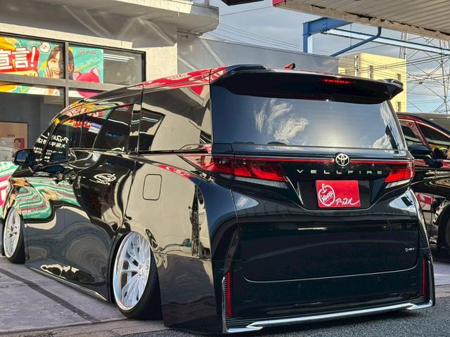 ヴェルファイアハイブリッド Z プレミア 室内車庫保管 エアサス WORK製SCHWERT BRUNNEN20インチ サンルーフ ユニバーサルサイドステップ ブラックレザー デジタルミラー 純正前後ドラレコ ETC2.0 ※純正足回り有(20枚目)