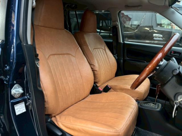 サクシード U 禁煙 ナルディステアリング 社外14インチAW TOYOブロックタイヤ(2025年製造タイヤ) ブラウンレザー調シートカバー ナビ ブルー バックカメラ(8枚目)