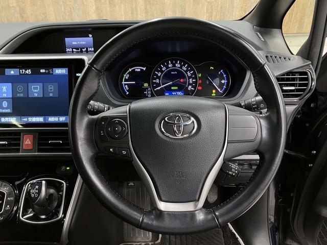 ヴォクシー ハイブリッドZS 煌II 純正10型後席モニター・純正10型フルセグナビ・両側電動ドア・クリアランスソナー・衝突軽減ブレーキ・車線逸脱警報・シートヒーター・純正16インチAW・ETC2.0・LEDヘッドライト・ドラレコ・スマー(52枚目)