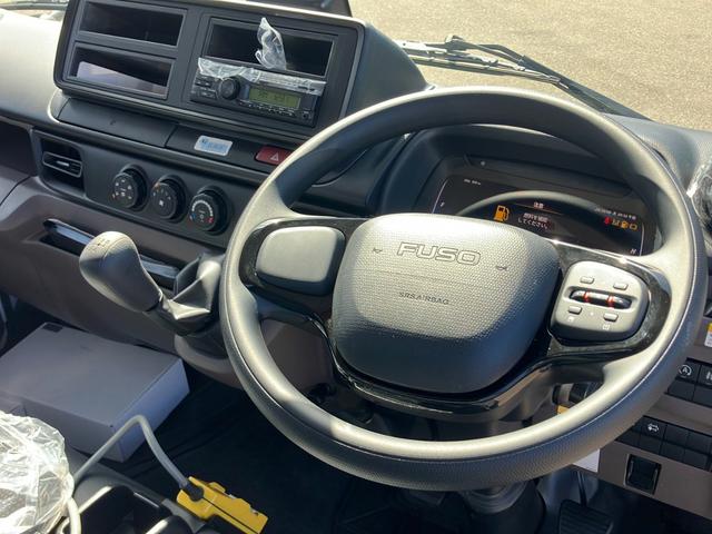 キャンター 　アームロール車／未使用／積載３ｔ／新明和製／５速マニュアル／バックモニター／ＥＴＣ／床材質鉄板／ターボ／１５０馬力！（23枚目）