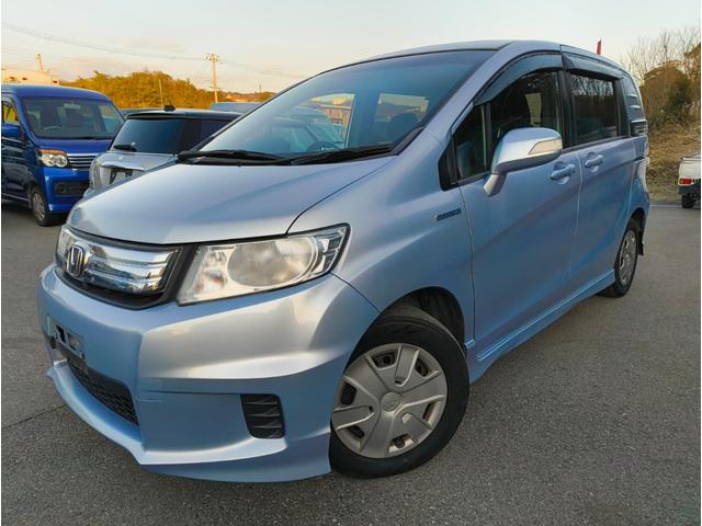 フリードスパイクハイブリッド ジャストセレクション　禁煙車！　鑑定書付き　ナビＴＶ　Ｂカメラ　Ｂｌｕｅｔｏｏｔｈ　クルコン　新品ドライブレコーダー　ＥＴＣ　ＨＩＤ　横滑り防止　電動スライド　電動ミラー　スマートキー　ノーペット（4枚目）