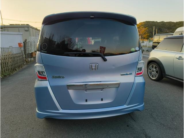 フリードスパイクハイブリッド ジャストセレクション　禁煙車！　鑑定書付き　ナビＴＶ　Ｂカメラ　Ｂｌｕｅｔｏｏｔｈ　クルコン　新品ドライブレコーダー　ＥＴＣ　ＨＩＤ　横滑り防止　電動スライド　電動ミラー　スマートキー　ノーペット（9枚目）