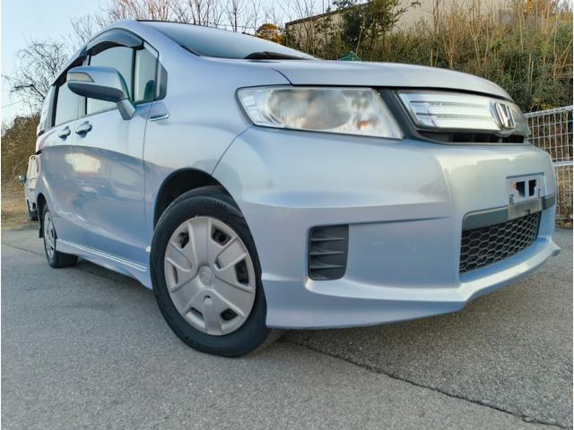 フリードスパイクハイブリッド ジャストセレクション　禁煙車！　鑑定書付き　ナビＴＶ　Ｂカメラ　Ｂｌｕｅｔｏｏｔｈ　クルコン　新品ドライブレコーダー　ＥＴＣ　ＨＩＤ　横滑り防止　電動スライド　電動ミラー　スマートキー　ノーペット（14枚目）