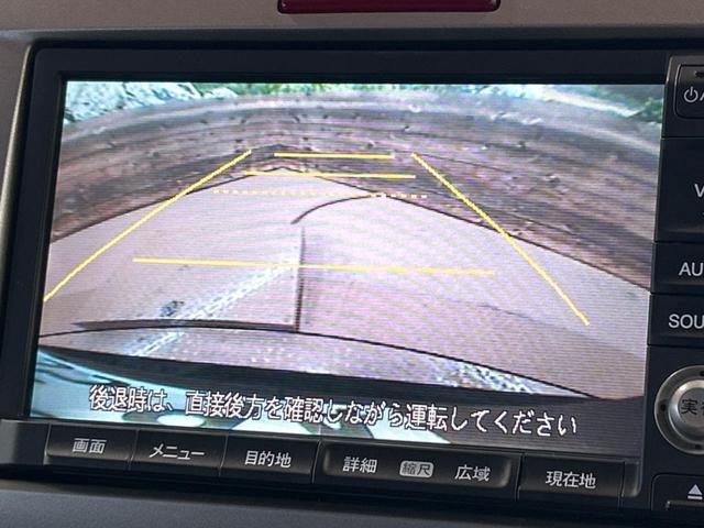 フリード Ｇ　ジャストセレクション　フリップダウンモニター　禁煙車　純正ナビ　バックカメラ　ＨＩＤヘッドライト　片側電動スライドドア　Ｂｌｕｅｔｏｏｔｈ再生　ＥＴＣ　ＣＤ／ＤＶＤ　盗難防止システム　プライバシーガラス　オートエアコン（5枚目）