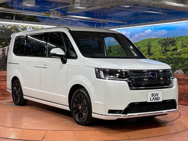 ステップワゴン e:HEVスパーダ 登録済未使用車 純正11型ナビ バックカメラ パワーバックドア 両側パワースライドドア ホンダセンシング ブラインドスポットモニター 前席シートヒーター オットマン LEDヘッド 純正16インチアルミ(17枚目)