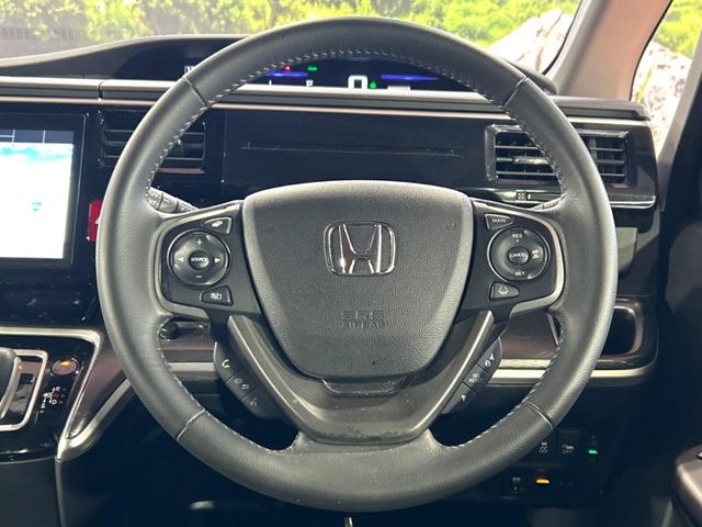 ステップワゴンスパーダ スパーダハイブリッド G・EX ホンダセンシング フリップダウンモニター 純正ナビ バックカメラ ホンダセンシング LEDヘッドライト シートヒーター 両側電動スライドドア ETC フルセグ スマートキー 純正16インチアルミホイール(11枚目)