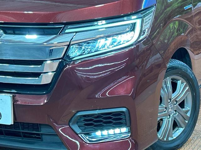 ステップワゴンスパーダ スパーダハイブリッド G・EX ホンダセンシング フリップダウンモニター 純正ナビ バックカメラ ホンダセンシング LEDヘッドライト シートヒーター 両側電動スライドドア ETC フルセグ スマートキー 純正16インチアルミホイール(12枚目)