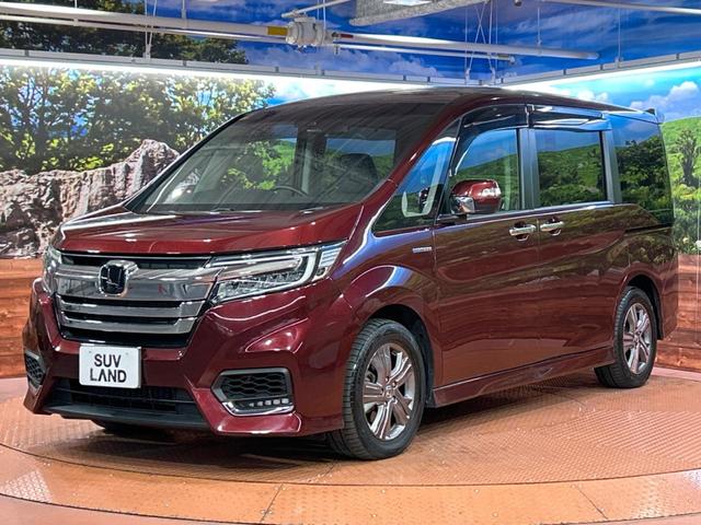 ステップワゴンスパーダ スパーダハイブリッド G・EX ホンダセンシング フリップダウンモニター 純正ナビ バックカメラ ホンダセンシング LEDヘッドライト シートヒーター 両側電動スライドドア ETC フルセグ スマートキー 純正16インチアルミホイール(28枚目)