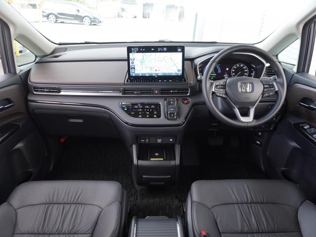 オデッセイハイブリッド ｅ：ＨＥＶアブソルート・ＥＸ　弊社デモカー　１１．４インチナビ　（ＬＸＭ－２４７ＶＦＬｉ）　フルセグ　全周囲カメラ　ＥＴＣ　ドラレコ（ナビ連動）　前後障害物センサー　電動リアゲート・本革シート　シートヒーター　ブラインドスポット（8枚目）