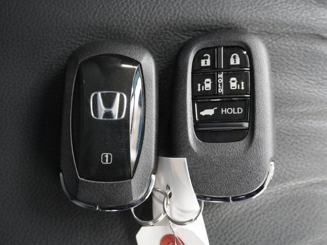 オデッセイハイブリッド ｅ：ＨＥＶアブソルート・ＥＸ　弊社デモカー　１１．４インチナビ　（ＬＸＭ－２４７ＶＦＬｉ）　フルセグ　全周囲カメラ　ＥＴＣ　ドラレコ（ナビ連動）　前後障害物センサー　電動リアゲート・本革シート　シートヒーター　ブラインドスポット（37枚目）