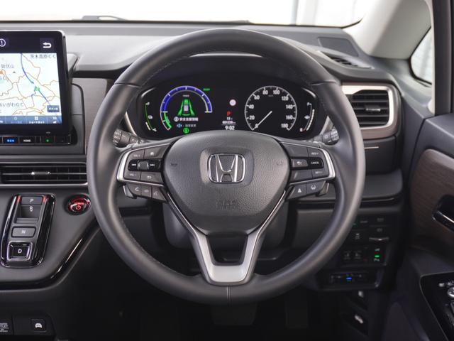 オデッセイハイブリッド ｅ：ＨＥＶアブソルート・ＥＸ　弊社デモカー　１１．４インチナビ　（ＬＸＭ－２４７ＶＦＬｉ）　フルセグ　全周囲カメラ　ＥＴＣ　ドラレコ（ナビ連動）　前後障害物センサー　電動リアゲート・本革シート　シートヒーター　ブラインドスポット（49枚目）