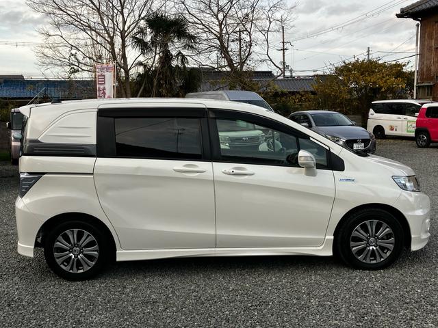 フリードスパイクハイブリッド ジャストセレクション　純正ギャザーズナビ　ワンセグ　バックカメラ　ＥＴＣ　両側パワースライドドア　純正アルミホイール　クルーズコントロール　スマートキー（10枚目）