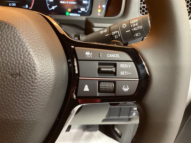 ステップワゴン スパーダ バックカメラ クリアランスソナー 両側電動スライドドア オートライト 電動リアゲート スマートキー 電動格納ミラー シートヒーター 3列シート CVT アルミホイール ESC エアコン(11枚目)