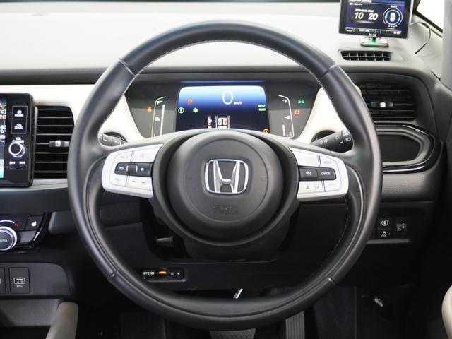 フィット ｅ：ＨＥＶホーム２０周年特別仕様車メゾン　１年保証　ナビ　ドライブレコーダー　バックカメラ　ＥＴＣ　クルーズコントロール　Ｂｌｕｅｔｏｏｔｈ　地デジ　スタートストップスイッチ（11枚目）