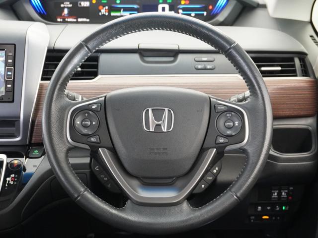 フリードハイブリッド ハイブリッド・クロスターホンダセンシング　１年保証　ナビ　ドライブレコーダー　バックカメラ　ＥＴＣ　両側電動スライドドア　Ｂｌｕｅｔｏｏｔｈ　地デジ　スタートストップスイッチ（9枚目）