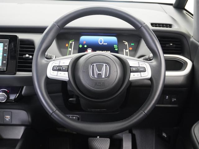 フィット ｅ：ＨＥＶホーム　２年保証　ナビ　ドライブレコーダー　バックカメラ　ＥＴＣ　クルーズコントロール　Ｂｌｕｅｔｏｏｔｈ　地デジ　スタートストップスイッチ　オートエアコン（9枚目）