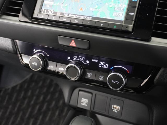 フィット ｅ：ＨＥＶホーム　２年保証　ナビ　ドライブレコーダー　バックカメラ　ＥＴＣ　クルーズコントロール　Ｂｌｕｅｔｏｏｔｈ　地デジ　スタートストップスイッチ　オートエアコン（11枚目）