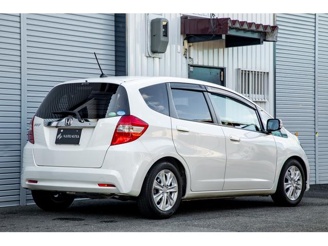 フィット 15XH ファインスタイル GE8最終モデル特別仕様車15XHファインスタイル!記録簿9枚・メモリナビ・Bカメラ・地デジ・HID・無限サス・専用15インチAW・専用メッキグリル&リアガーニッシュ・専用ブラウン内装・新品シフトノブ(3枚目)