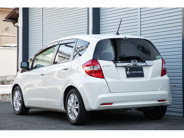 フィット 15XH ファインスタイル GE8最終モデル特別仕様車15XHファインスタイル!記録簿9枚・メモリナビ・Bカメラ・地デジ・HID・無限サス・専用15インチAW・専用メッキグリル&リアガーニッシュ・専用ブラウン内装・新品シフトノブ(4枚目)