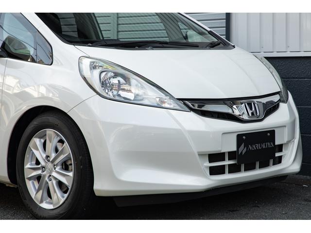 フィット 15XH ファインスタイル GE8最終モデル特別仕様車15XHファインスタイル!記録簿9枚・メモリナビ・Bカメラ・地デジ・HID・無限サス・専用15インチAW・専用メッキグリル&リアガーニッシュ・専用ブラウン内装・新品シフトノブ(5枚目)