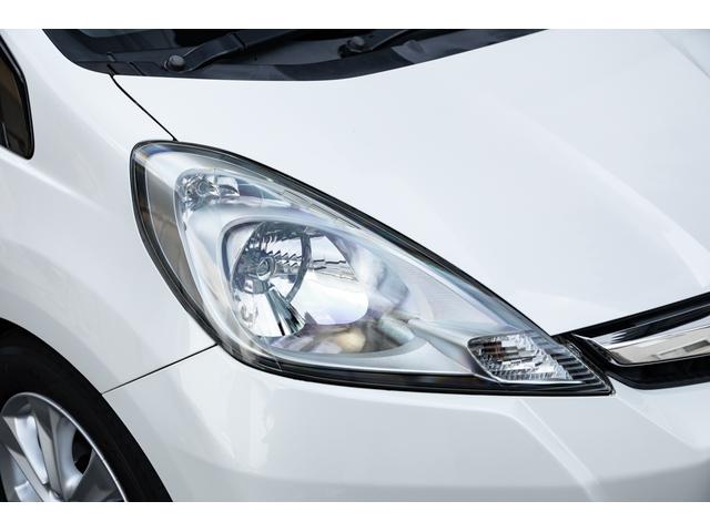 フィット 15XH ファインスタイル GE8最終モデル特別仕様車15XHファインスタイル!記録簿9枚・メモリナビ・Bカメラ・地デジ・HID・無限サス・専用15インチAW・専用メッキグリル&リアガーニッシュ・専用ブラウン内装・新品シフトノブ(7枚目)