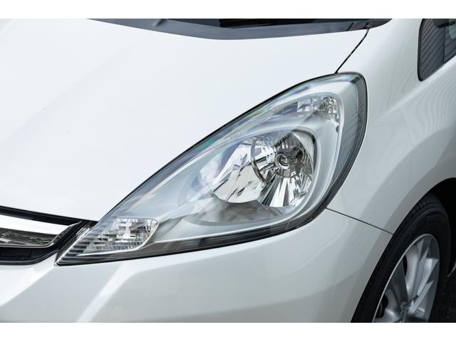 フィット 15XH ファインスタイル GE8最終モデル特別仕様車15XHファインスタイル!記録簿9枚・メモリナビ・Bカメラ・地デジ・HID・無限サス・専用15インチAW・専用メッキグリル&リアガーニッシュ・専用ブラウン内装・新品シフトノブ(8枚目)