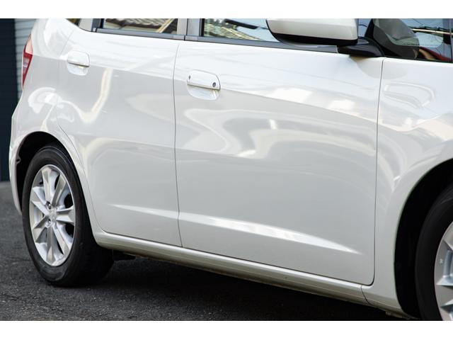 フィット 15XH ファインスタイル GE8最終モデル特別仕様車15XHファインスタイル!記録簿9枚・メモリナビ・Bカメラ・地デジ・HID・無限サス・専用15インチAW・専用メッキグリル&リアガーニッシュ・専用ブラウン内装・新品シフトノブ(9枚目)