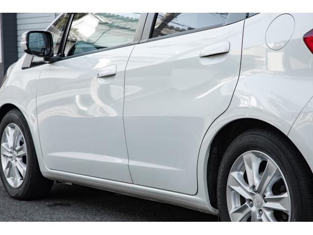 フィット 15XH ファインスタイル GE8最終モデル特別仕様車15XHファインスタイル!記録簿9枚・メモリナビ・Bカメラ・地デジ・HID・無限サス・専用15インチAW・専用メッキグリル&リアガーニッシュ・専用ブラウン内装・新品シフトノブ(10枚目)