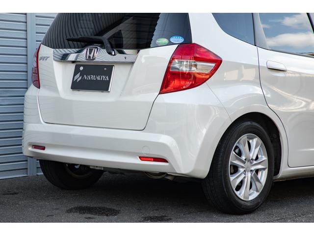 フィット 15XH ファインスタイル GE8最終モデル特別仕様車15XHファインスタイル!記録簿9枚・メモリナビ・Bカメラ・地デジ・HID・無限サス・専用15インチAW・専用メッキグリル&リアガーニッシュ・専用ブラウン内装・新品シフトノブ(11枚目)