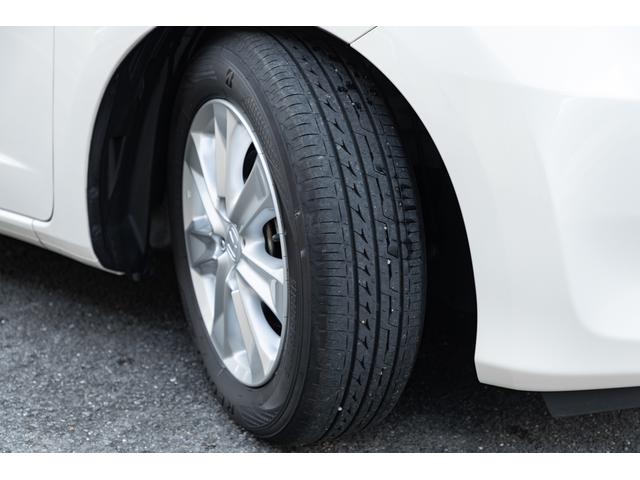 フィット 15XH ファインスタイル GE8最終モデル特別仕様車15XHファインスタイル!記録簿9枚・メモリナビ・Bカメラ・地デジ・HID・無限サス・専用15インチAW・専用メッキグリル&リアガーニッシュ・専用ブラウン内装・新品シフトノブ(19枚目)