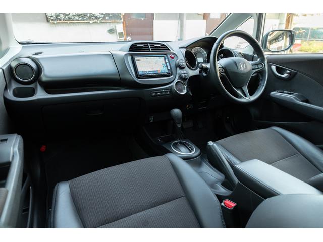 フィット 15XH ファインスタイル GE8最終モデル特別仕様車15XHファインスタイル!記録簿9枚・メモリナビ・Bカメラ・地デジ・HID・無限サス・専用15インチAW・専用メッキグリル&リアガーニッシュ・専用ブラウン内装・新品シフトノブ(20枚目)