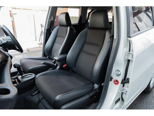 フィット 15XH ファインスタイル GE8最終モデル特別仕様車15XHファインスタイル!記録簿9枚・メモリナビ・Bカメラ・地デジ・HID・無限サス・専用15インチAW・専用メッキグリル&リアガーニッシュ・専用ブラウン内装・新品シフトノブ(23枚目)