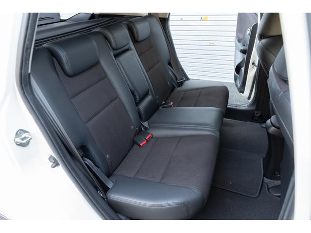 フィット 15XH ファインスタイル GE8最終モデル特別仕様車15XHファインスタイル!記録簿9枚・メモリナビ・Bカメラ・地デジ・HID・無限サス・専用15インチAW・専用メッキグリル&リアガーニッシュ・専用ブラウン内装・新品シフトノブ(24枚目)